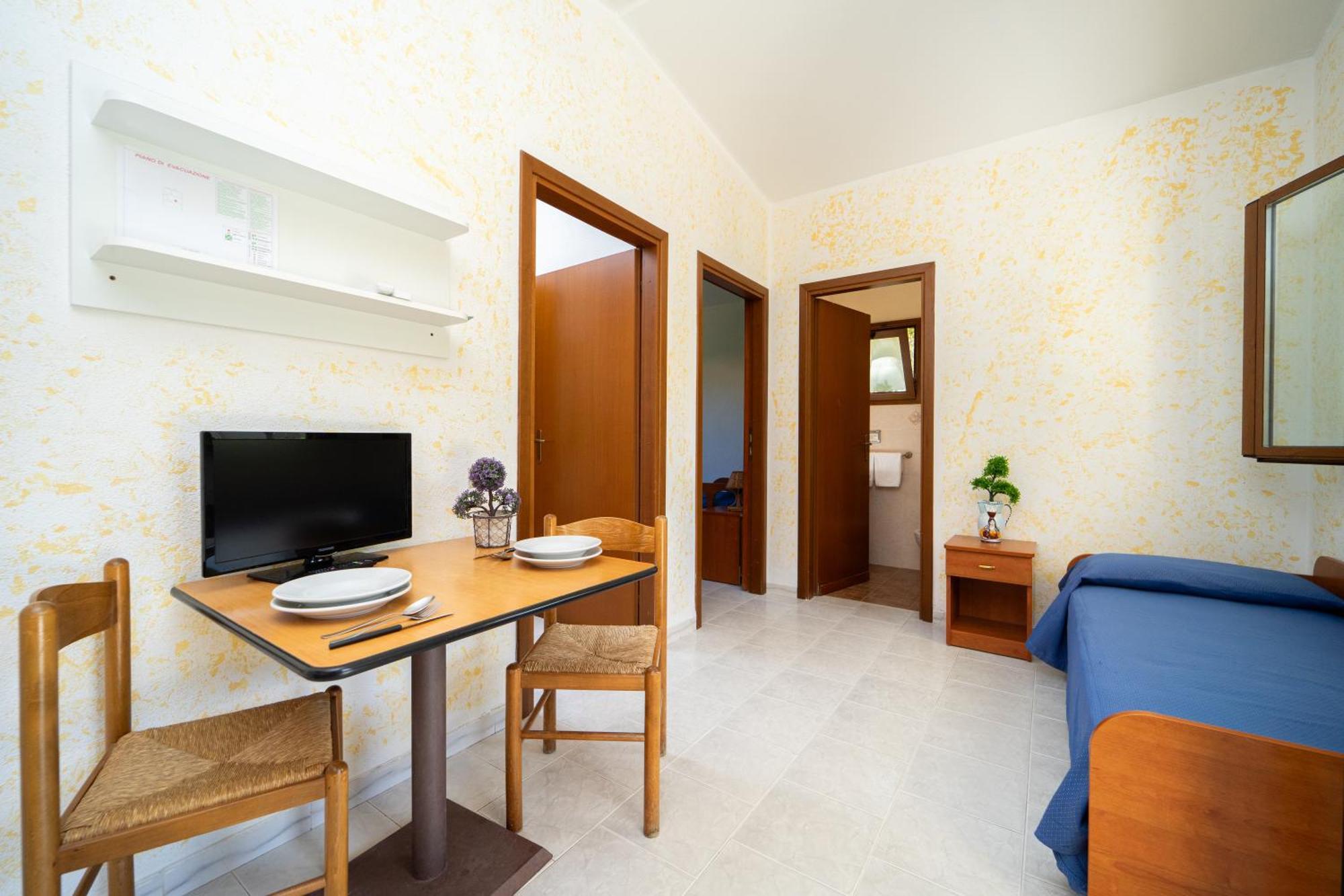 Hotel Villaggio Roller Club Ricadi Habitación foto